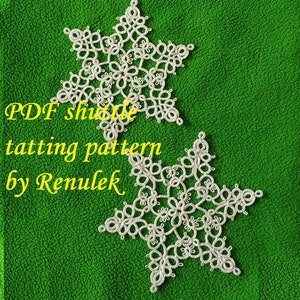 May include: Two white crocheted snowflakes on a green background. The text "PDF shuttle tatting pattern by Renulek" is visible in the image.