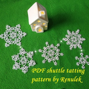 May include: Five white snowflake-shaped crocheted doilies on a green background. The text "PDF shuttle tatting pattern by Renulek" is below the doilies.