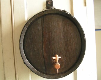 vinegar, already been used, made of stave oak, very pretty as decoration for a kitchen