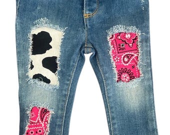 Girls Distressed Cow Print Jeans with Pink Bandanna Patches