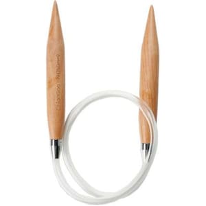 May include: Circular knitting needles with light brown wooden tips and a clear, flexible cable. The needles are connected by a silver metal piece. The text "Chiaogoo" is printed on the needle. The needles are 15.0mm in size.