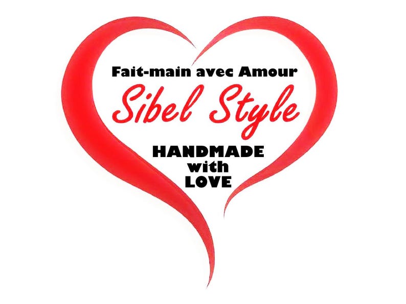 May include: A red heart outline graphic containing the black text Fait-main avec Amour, the red script text Sibel Style, and the black text HANDMADE with LOVE, all centered within the heart shape against a plain white background.