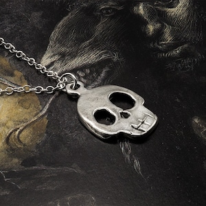 Handmade Silver Skull Necklace: Contemporary Metal Pendant