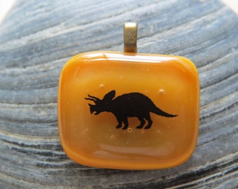 0289 - Dinosaur on Burnt Orange Fused Glass Pendant