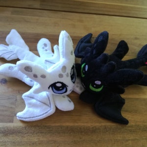 Nigthfury and Lightfury Dragon Plushies