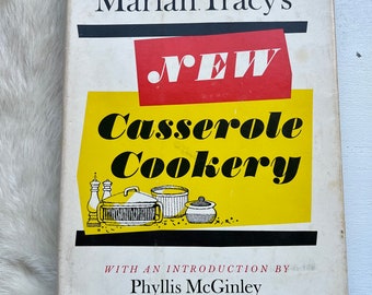 May include: A vintage cookbook titled "Marian Tracy's New Casserole Cookery" with an introduction by Phyllis McGinley. The cover features a yellow background with black text and a red and white "NEW" label. A black and white illustration of a casserole dish and other kitchenware is shown.