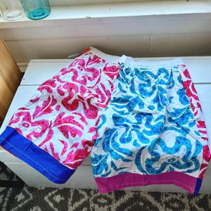 Vintage color blocked swim trunks pink blue white red surf shorts Hawaiian print 1990s 1980s NOS retro board shorts Men’s size XL tie front