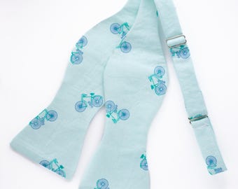 mini bicycles self tie bow tie, aqua blue cycling bow tie, novelty bow ties for men, unique fun bow tie, minty blue bowtie, gift for cyclist