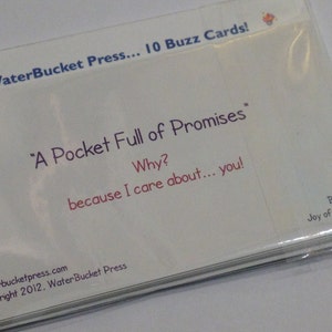 May include: A white card with the text "WaterBucket Press... 10 Buzz Cards!" at the top. The text "A Pocket Full of Promises" is in the center of the card. Below that is the text "Why? because I care about... you!" The text "waterbucketpress.com Copyright 2012. WaterBucket Press" is at the bottom of the card. The text "Buzz-10 Joy of the Lord" is in the bottom right corner of the card.