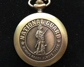 National Guard Bronze Custom Pill Box Medicine Tablet Holder for Pocket or Purse, comes with necklace, a belt clip chain is extra