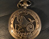 Zodiac, Capricorn Bronze Custom Pill Box Medicine Tablet Holder for Pocket or Purse, comes with necklace, Belt clip chain is extra.