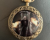 CapitGrim Reaper With Skeletons, Bronze Pill Box Medicine Tablet Holder for Pocket or Purse, comes with necklace, belt clip chain is extra