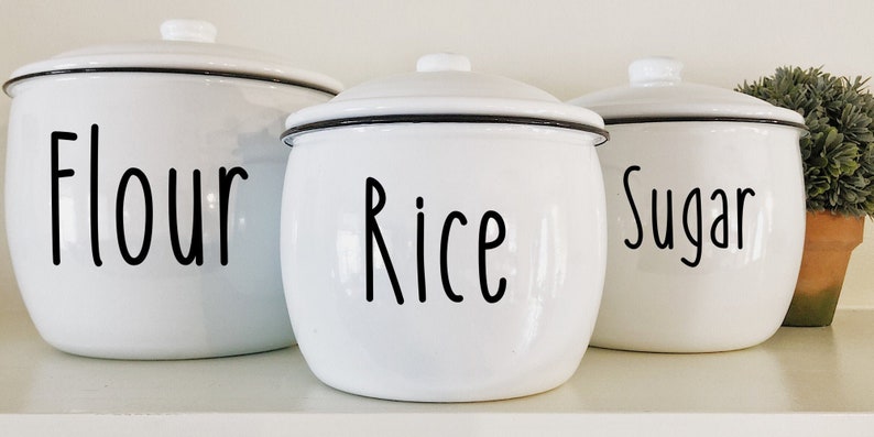 Kitchen organization products are what help make a kitchen more efficient. If you can't find what you need quickly, everything takes longer! Get a more efficient kitchen with these organization products you'll find on Etsy. These canisters are customizable and so adorable! 