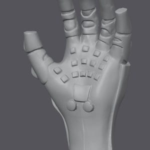 Könnte beinhalten: Eine graue Roboterhand mit detailliertem Design. Die Hand weist quadratische Elemente auf der Handfläche und zylindrische Fingerspitzen auf. Die Finger sind leicht gekrümmt, und das Gesamtdesign deutet auf ein futuristisches oder mechanisches Thema hin.