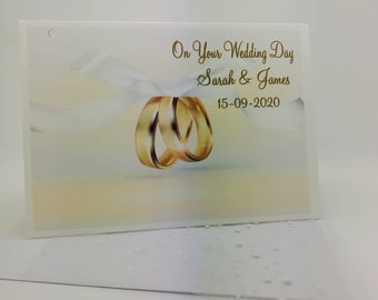 Stylish and elegant personalised Wedding or engagement card on luxurious textured background.