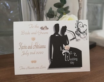 Stylish and elegant personalised Wedding card on luxurious textured background.