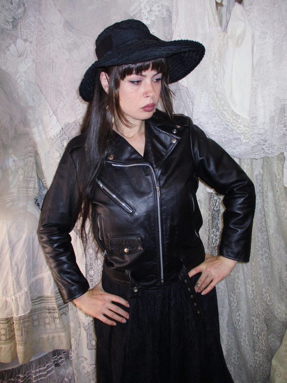 Black Leather Cropped Motorcycle Jacket Quilted Lining Missing Buckle Classic Thick Moto Coat Some Distress and Wear Trad Goth Punk Rocker