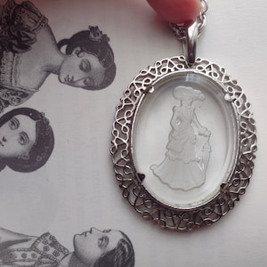 Avon Elegant Victorian Woman w Umbrella Cameo Necklace Clear Carved Frosted Glass Long Chain Oval Pendant Prairie Cottagecore Silver 80s 90s image 1