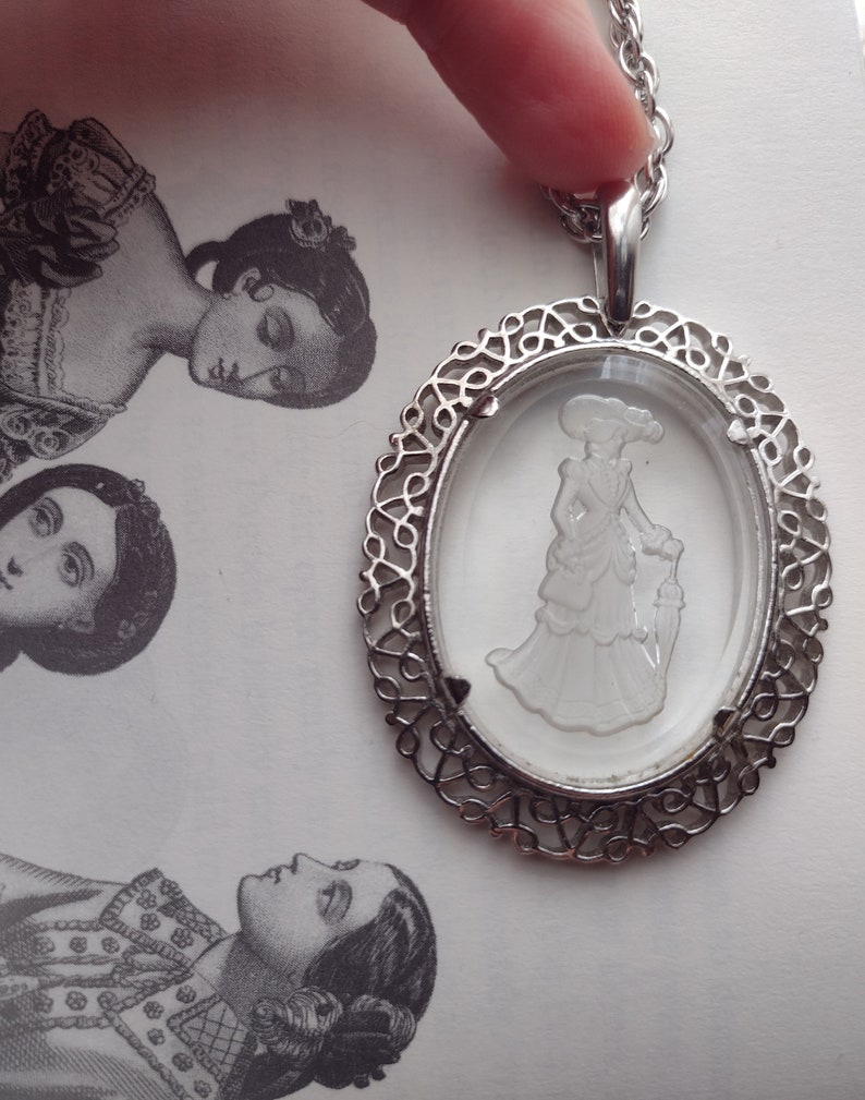 Avon Elegant Victorian Woman w Umbrella Cameo Necklace Clear Carved Frosted Glass Long Chain Oval Pendant Prairie Cottagecore Silver 80s 90s image 1