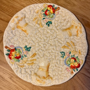 Decorative Plate designed by Clarice Cliff made by Newport Pottery, England, Celtic Harvest pattern, 1930s-40s.