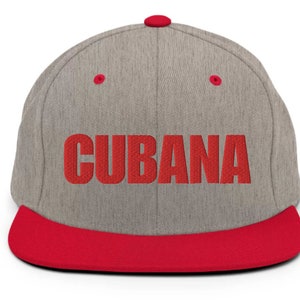 May include: A gray and red baseball cap with the word 'CUBANA' embroidered in red on the front.