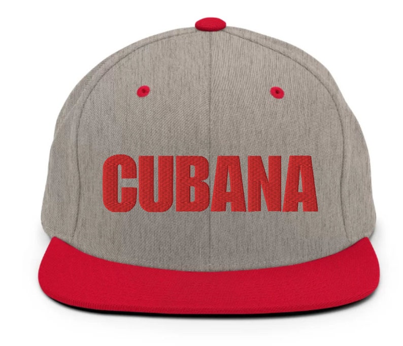 May include: A gray and red baseball cap with the word 'CUBANA' embroidered in red on the front.