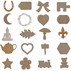 May include: A set of 20 wooden cutout shapes, including a horseshoe, bow, heart, star, flower, mushroom, and more. The shapes are all unfinished and ready to be painted or stained.