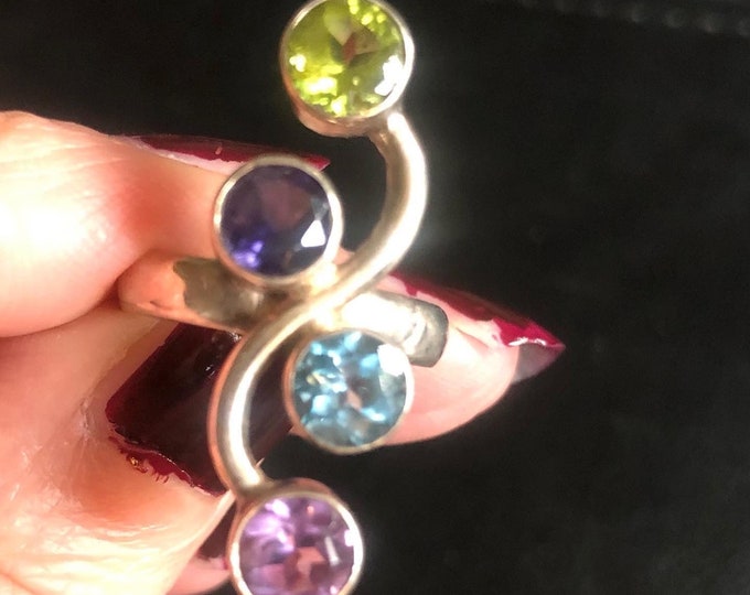 Silver ring with gemstones, amethyst, garnet, peridot and blue topaz