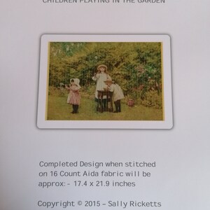 May include: A cross-stitch pattern titled Ric-Creations Crafts Children Playing in the Garden. The image shows three children in a garden. Text states the completed design on 16 count Aida fabric is approximately 17.4 x 21.9 inches. Copyright 2015.