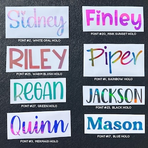 a collection of personalized name stickers with various color schemes and styles, including names like Sidney, Finley, Riley, Piper, Regan, Jackson, Quinn, and Mason.
