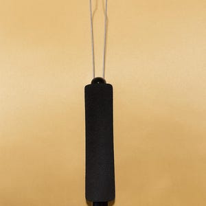 The Effortless Button Hook for those hard to get buttons on clothing.