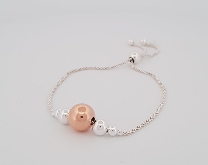 Expandable bracelet with Rose gold and silver beads