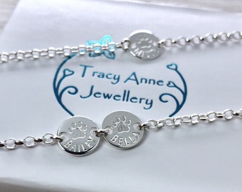 Paw print bracelet personalised with your pets name, engraved in sterling silver