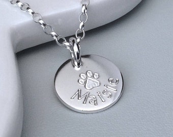 Paw print necklace engraved in sterling silver with pet's name, lovely gift for cat or dog lover