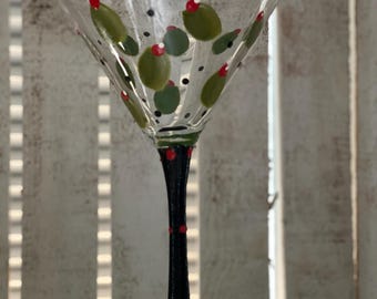 Martini glass hand painted with olives.