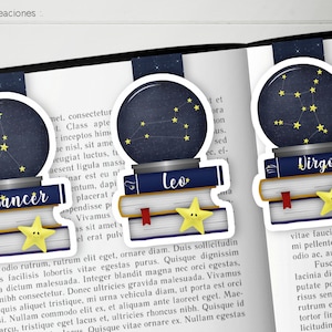 Könnte beinhalten: Drei farbenfrohe Lesezeichen mit einem Stapel Bücher, auf dem ein Stern liegt, und einer Glaskugel mit einem Sternbild darin. Die Sternbilder sind Krebs, Löwe und Jungfrau. Die Lesezeichen sind mit dem Namen jedes Sternbildes bedruckt.