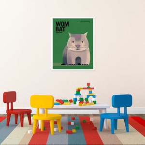 May include: A colorful illustration of a wombat, a marsupial native to Australia, with the text "WOMBAT" and "VOMBATIDAE" in black. The illustration is set against a green background.