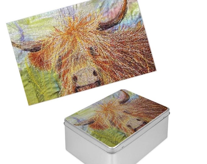 Featured listing image: 1000 piece jigsaw puzzle and tin.  Gift set for Highland cattle fans designed by Juliet Turnbull.  Made to order.