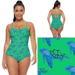 Retro full coverage swimming costume. Swooshing turtles art print design on blue art swimsuit by Juliet Turnbull. MADE TO ORDER