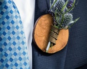 Rustic wooden boutonnieres with leather strapping