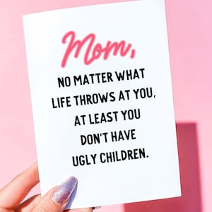 May include: A set of three ceramic mugs with a speckled, matte finish. The mugs are in shades of cream, light gray, and dark gray. Each mug has a simple, minimalist design and a rounded handle.