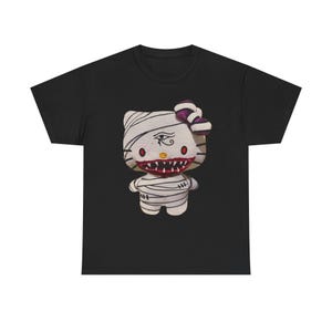 Hello Kitty Inspired Mummy T-Shirt – Glam Gore Horror Tee | Egyptian Eye & Scary Mouth | Unisex Heavyweight Undead Pet Shop Shirt Halloween