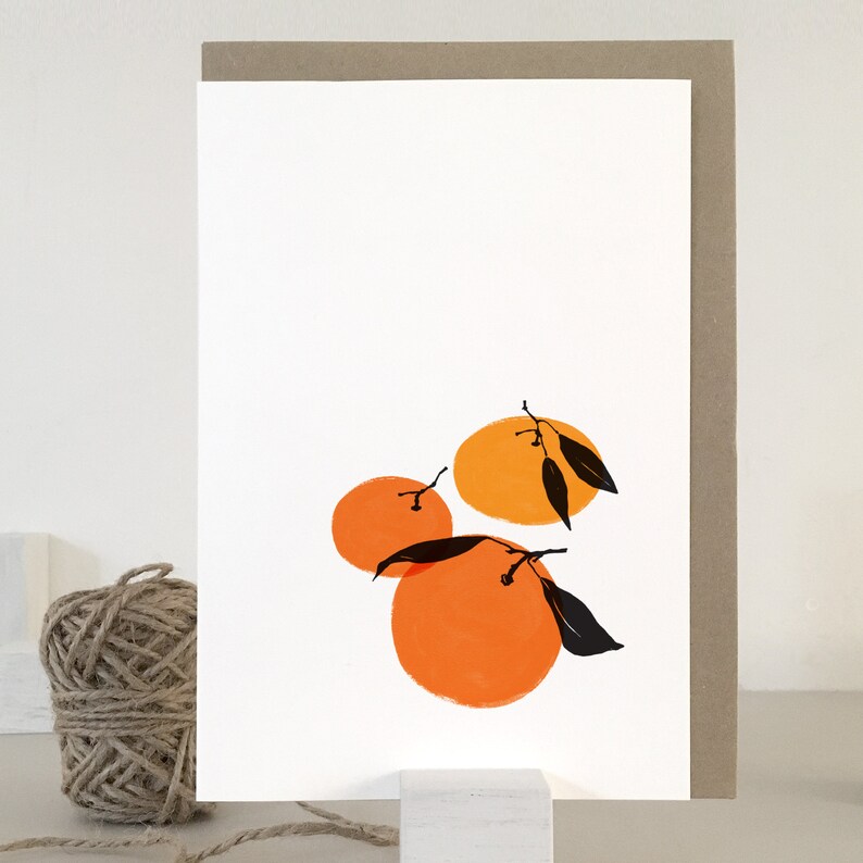 May include: A simple illustration of three orange citrus fruits with black leaves on a white background.