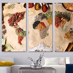 May include: A world map made of various spices and herbs on a brown background. The map is divided into three sections, each with a different assortment of spices. The spices are arranged in a way that resembles the continents of the world.