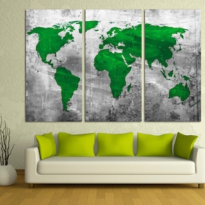 May include: A triptych canvas art piece featuring a world map in vibrant green against a distressed gray background. The artwork is displayed above a white sofa with lime green throw pillows, creating a modern and colorful interior design.