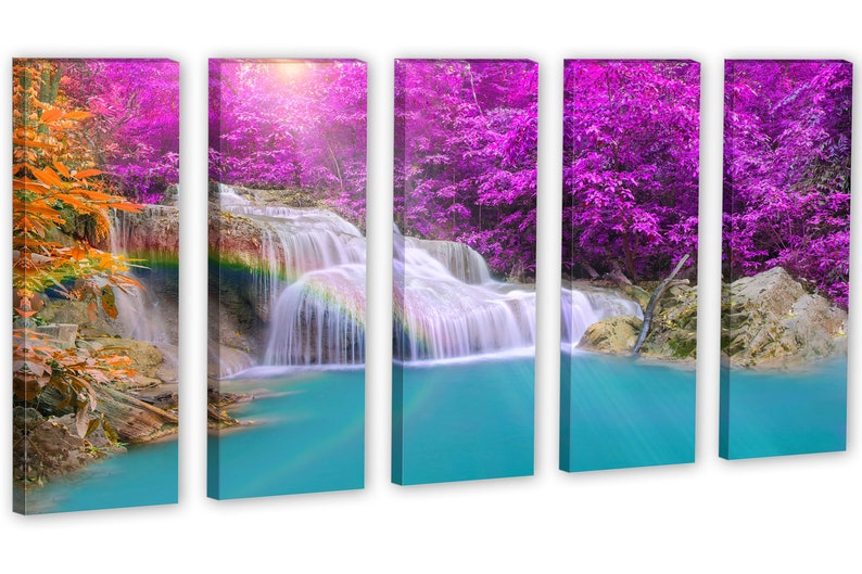 May include: A five-panel canvas print depicting a waterfall cascading through a lush forest. The trees have vibrant purple leaves and the water is a clear turquoise. A rainbow appears over the waterfall.