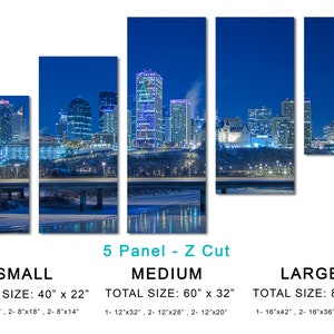 May include: A five-panel canvas print of a city skyline at night. The image shows tall buildings with illuminated windows against a dark blue sky. The total sizes are 40" x 22", 60" x 32", and 80" x 42".