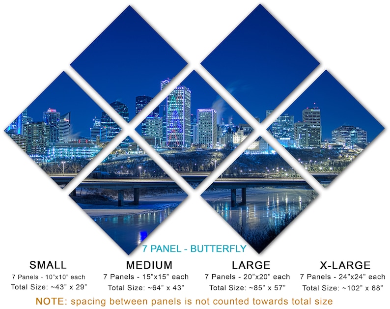 May include: A seven-panel wall art piece featuring a nighttime cityscape with illuminated buildings and a bridge over a body of water. The panels are arranged in a butterfly pattern. Available in small, medium, large, and x-large sizes.