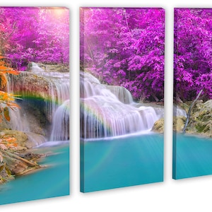May include: A three-panel canvas print featuring a waterfall cascading through a lush forest. The water is crystal clear and the forest is a vibrant mix of green and purple.