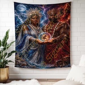 May include: A rectangular wall tapestry featuring a fantasy illustration of a regal couple. The figure on the left wears a blue gown and crown, while the figure on the right wears red garments and a crown. They hold a glowing orb containing a small figure.
